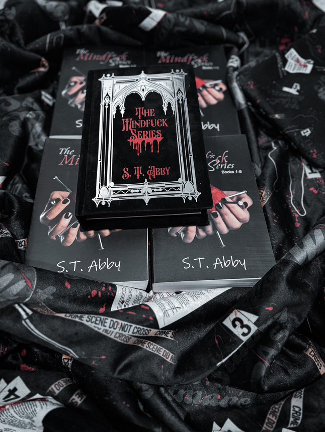 Custom rebind of The Mindf*ck Series by S.T. Abby with foiled gothic arch cover